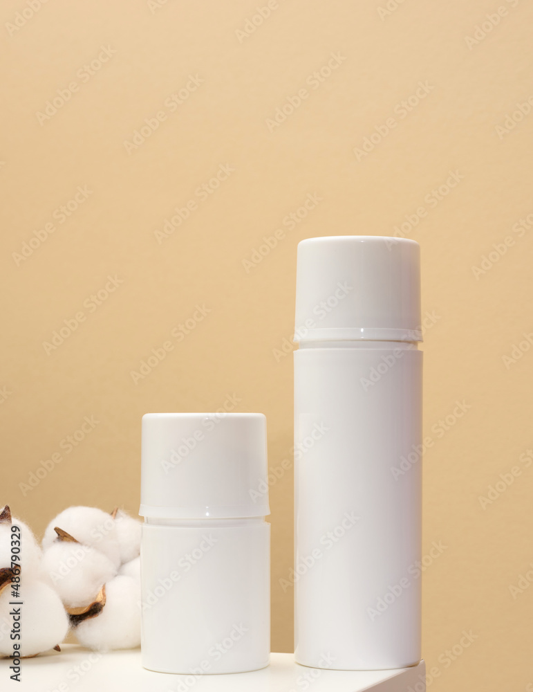 empty white plastic bottle on a beige background. Cosmetic products for  branding gel, cream, lotion, shampoo. Mock up eco cosmetics Stock Photo |  Adobe Stock