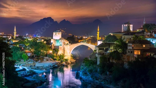 Mostar Bosnia and Herzegovina old town view at night time lapse, mostar skyline aerial view.