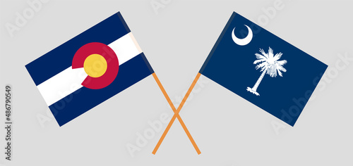 Crossed flags of The State of Colorado and The State of South Carolina. Official colors. Correct proportion