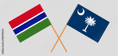 Crossed flags of the Gambia and The State of South Carolina. Official colors. Correct proportion