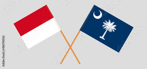 Crossed flags of Monaco and The State of South Carolina. Official colors. Correct proportion