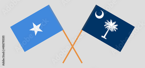 Crossed flags of Somalia and The State of South Carolina. Official colors. Correct proportion