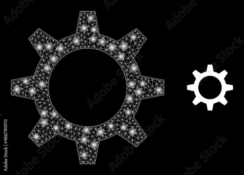 Cogwheel icon and shiny mesh net cogwheel structure with illuminated spots. Illuminated model is created from cogwheel vector icon and triangulated mesh. Glossy carcass cogwheel,