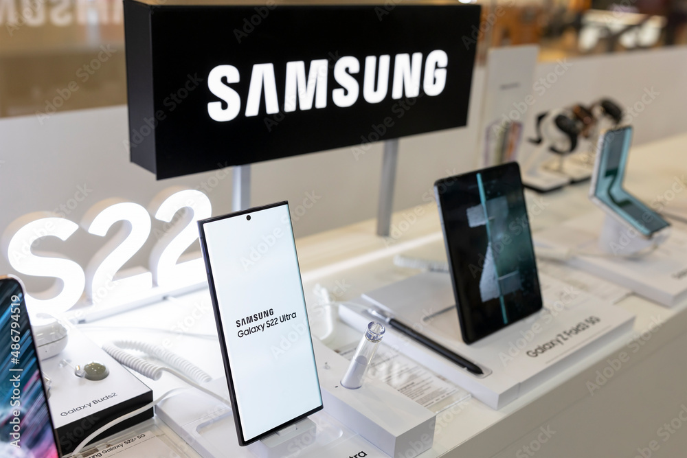 Samsung Galaxy S22 Ultra displayed with Z Fold 3 and Z Flip 3 in electronic  store. Stock Photo | Adobe Stock