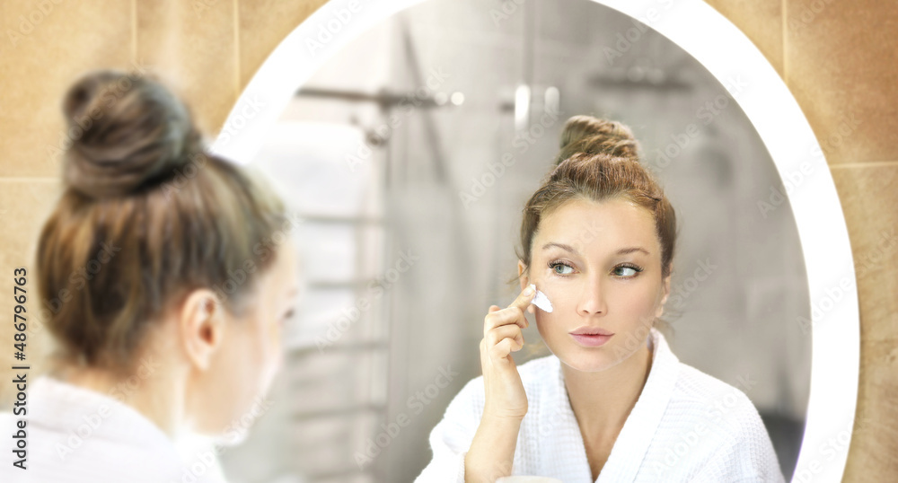 Applying the cream..Magic anti-aging cream. Applying the cream..Magic anti-aging cream.