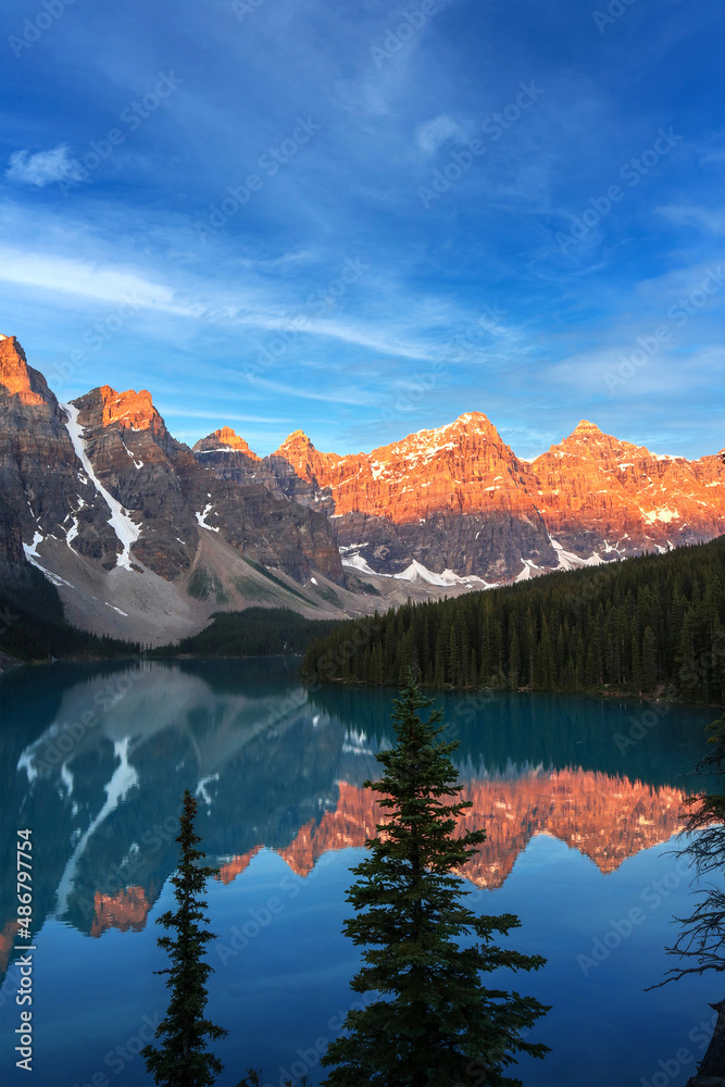 Golden Sunrise Over the Canadian Rockies at Moraine Lake in Canada