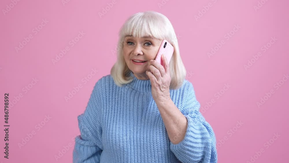 Cute granny answer device call speak family isolated pastel color background Cute granny answer device call speak family isolated pastel color background