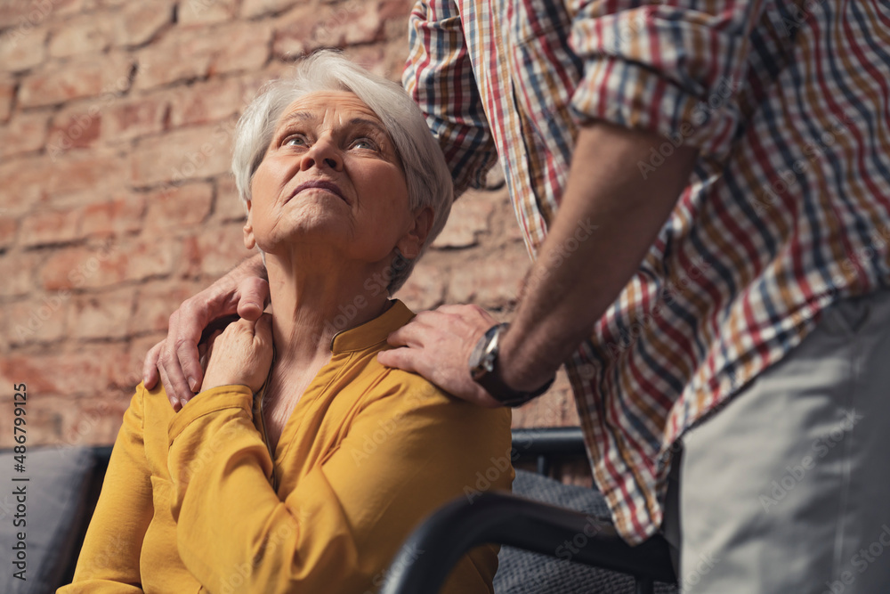 Obraz premium Old Senior Caucasian Woman With Dementia Getting Support And Care. High quality photo