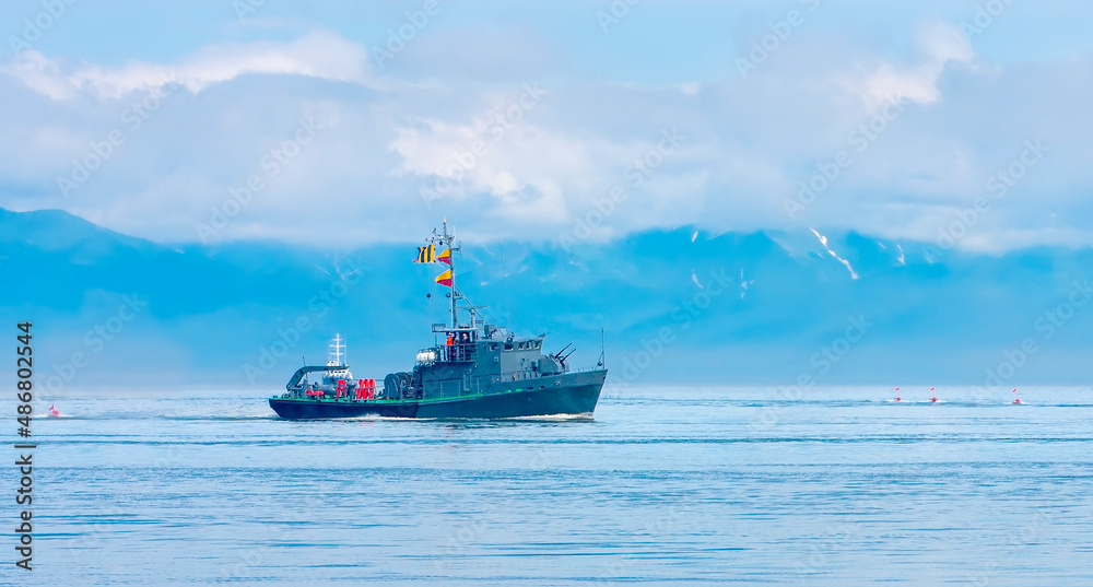 Naval minesweeper in Avacha bay on Kamchatka. Selective focus