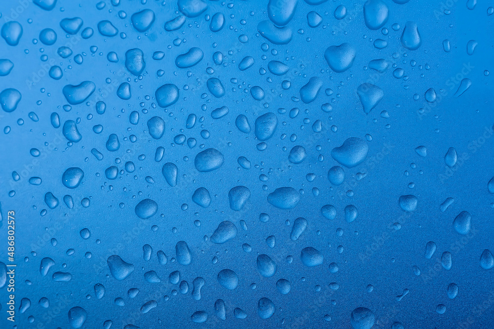 Abstract textured background of rain water drops 