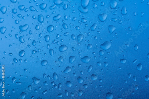Abstract textured background of rain water drops 