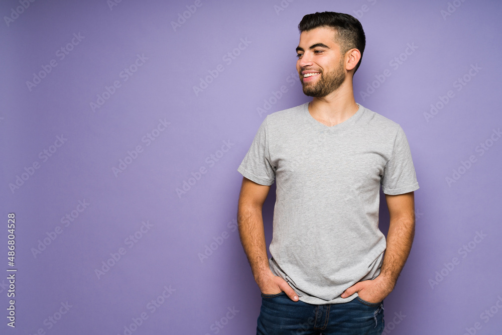 Hispanic young man laughing Hispanic young man laughing