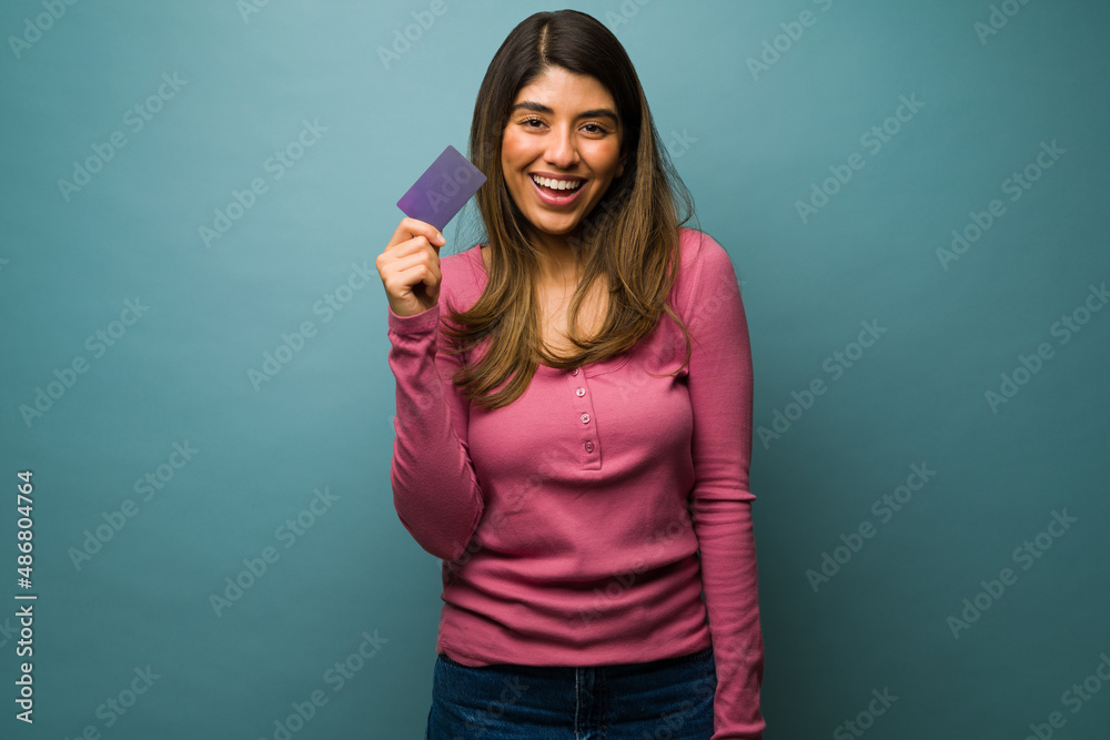 Latin woman got a new credit card Latin woman got a new credit card