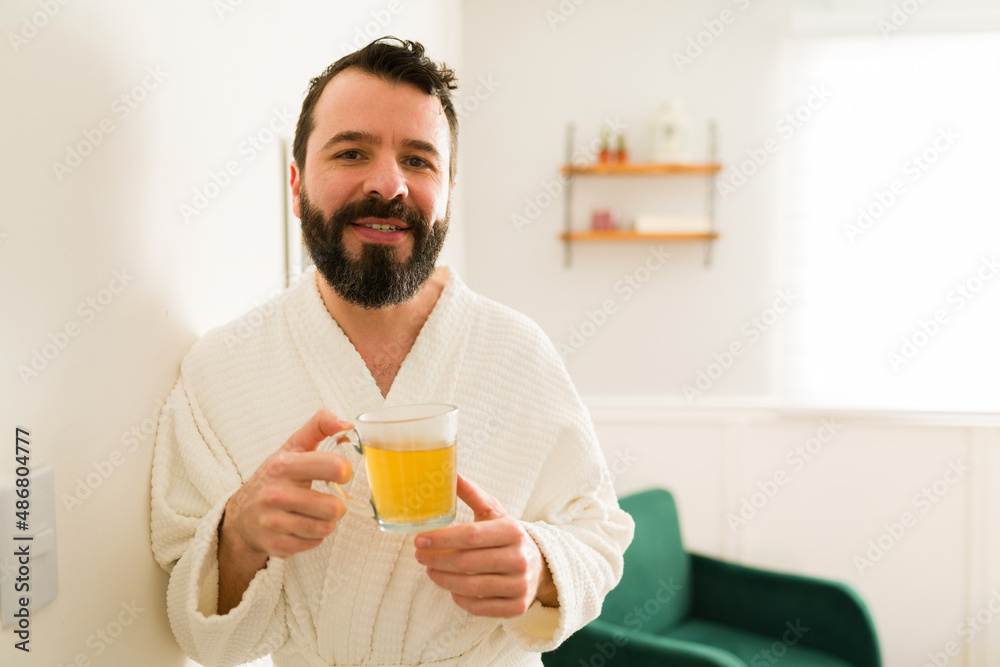 Cheerful man taking care of himself Cheerful man taking care of himself