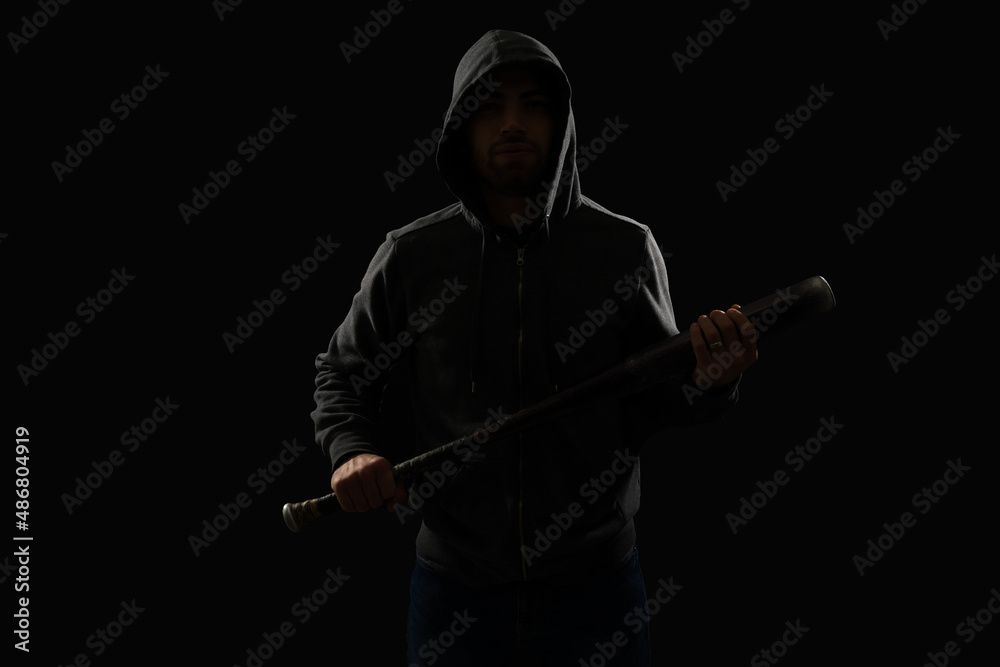 Portrait of a thug with a baseball bat Stock Photo | Adobe Stock