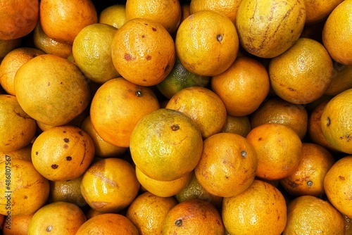 A group of juicy oranges for sale in the market