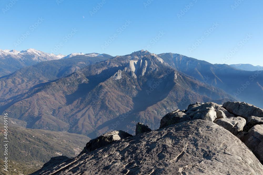 Top of the cliff, rocks, rocks and mountain range Top of the cliff, rocks, rocks and mountain range