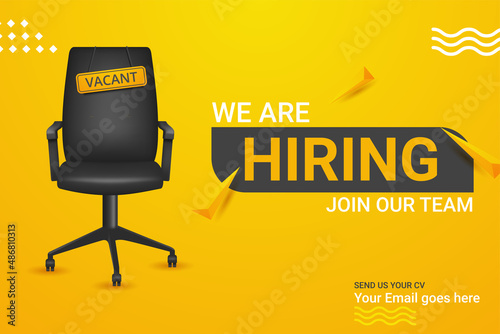 We're hiring with office chair and a sign vacant