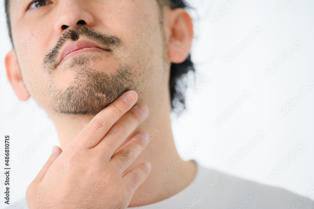 Obraz premium 顔なしで使いやすいヒゲのアップ コピースペースあり 横顔