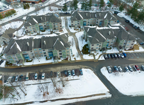 aerial view of apartment buildings after snow