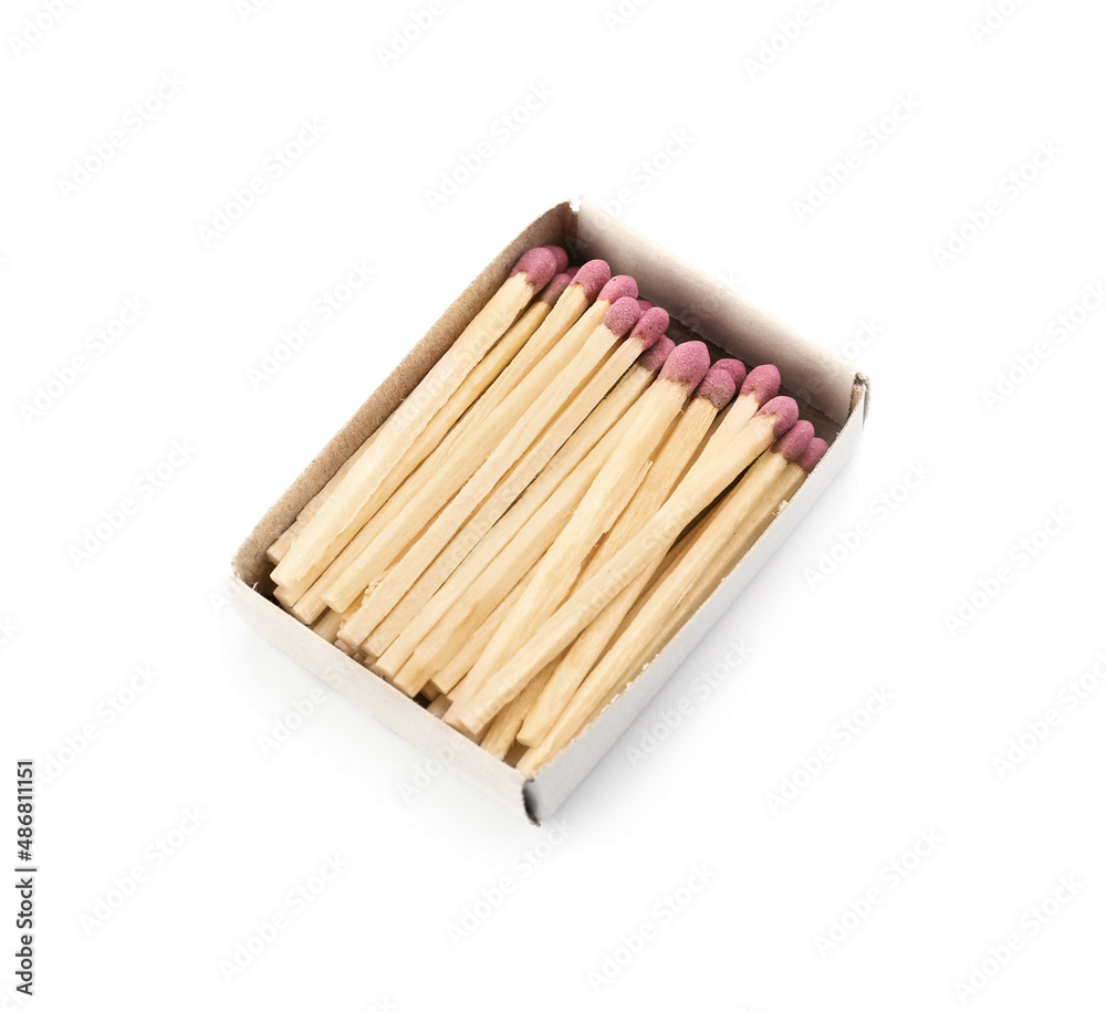 Matchbox with whole matches on white background