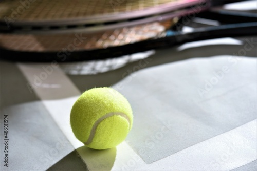 tennis racket and ball © taveesaksri