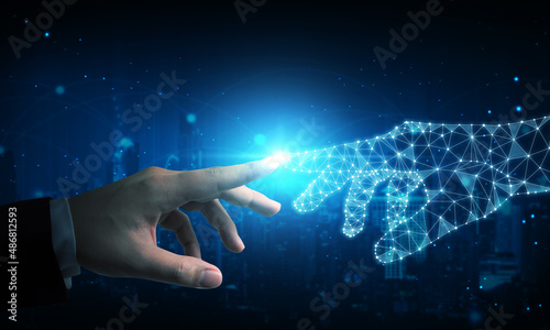 Hand of businessman touching hand artificial intelligence meaning technology connection go to future