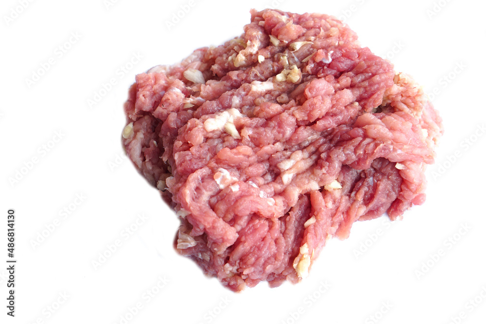 Closeup uncooked minced pork isolated on white background. Concept : Food ingredient. Cooking variety menu. Closeup uncooked minced pork isolated on white background. Concept : Food ingredient. Cooking variety menu.