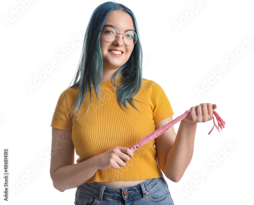 Young woman with whip from  sex shop on white background