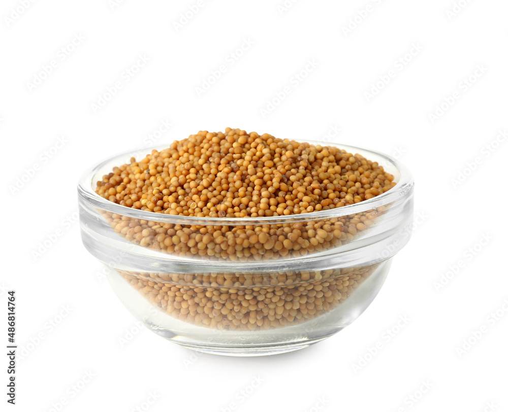 Bowl of mustard seeds on white background Bowl of mustard seeds on white background