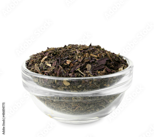 Bowl of aromatic herbal tea on white background
