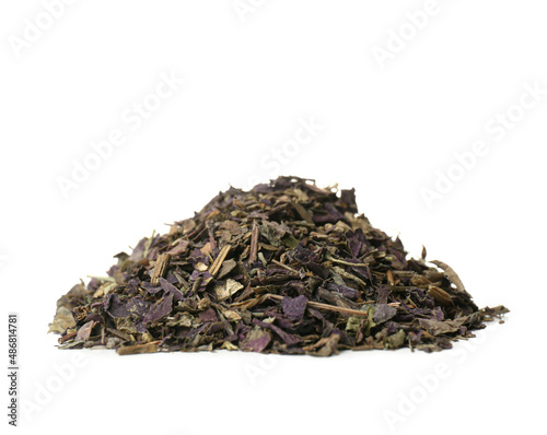 Heap of aromatic herbal tea on white background