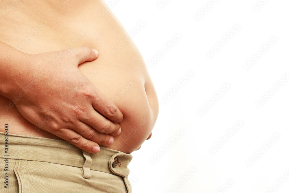 © methaphum - fat mature man check out body overweight abdomen his belly for white or obesity background. Weight loss concept.