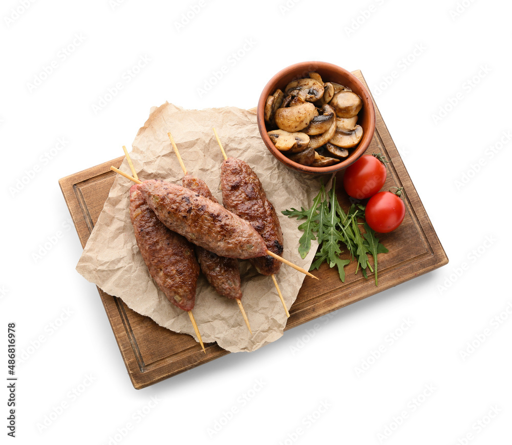 Wooden board of skewers with tasty lula kebab isolated on white background Wooden board of skewers with tasty lula kebab isolated on white background