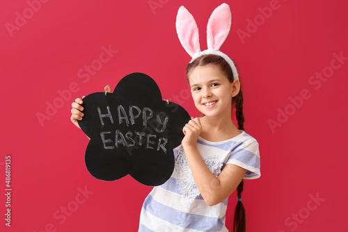 Funny little girl with bunn...