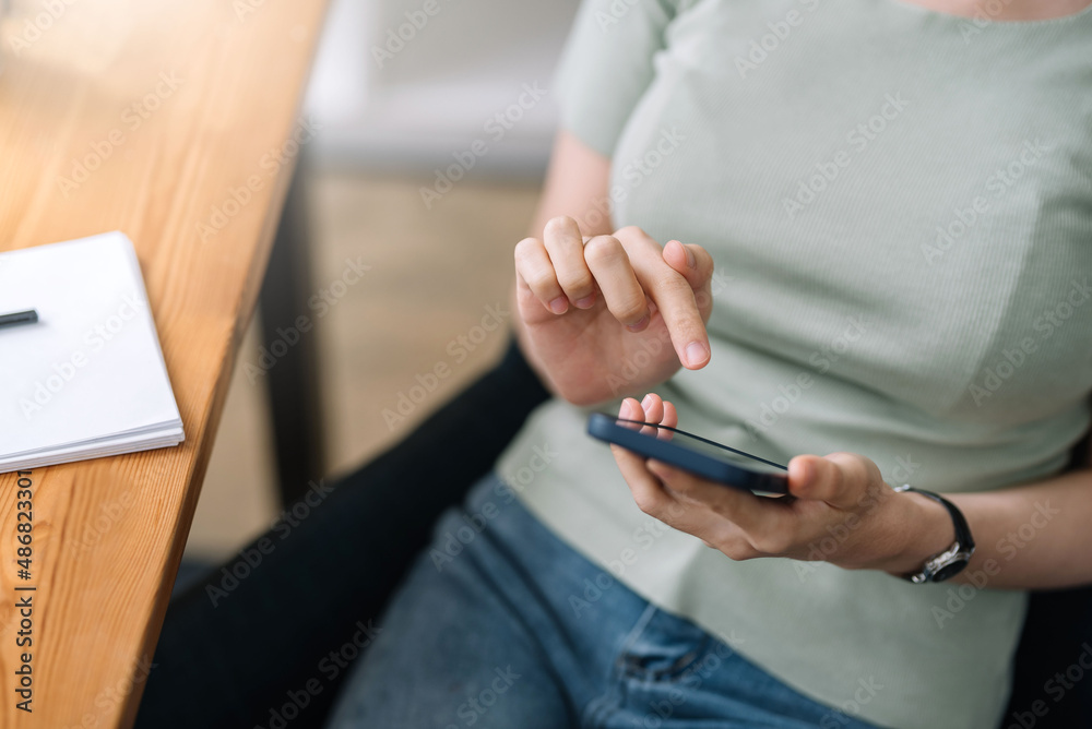 Woman using mobile phone to send text , work or play social media. Woman using mobile phone to send text , work or play social media.