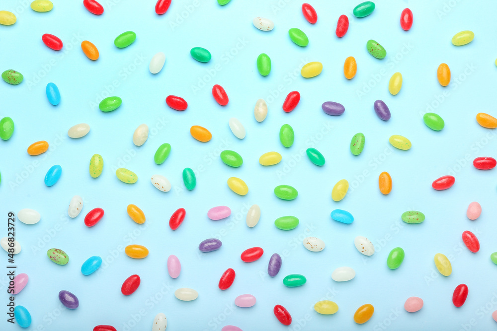 Different jelly beans on blue background Different jelly beans on blue background