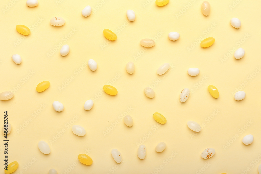 Different jelly beans on beige background