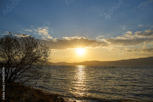 Fototapeta Naklejka Na Ścianę i Meble -  琵琶湖湖畔の夕日