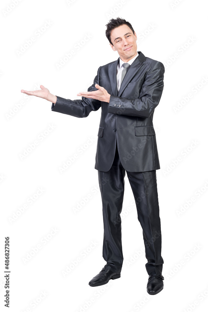 Optimistic man in suit pointing aside. White background. Optimistic man in suit pointing aside. White background.