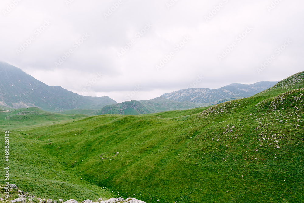 Cloudy sky over mountains in Durmitor National Park. Montenegro