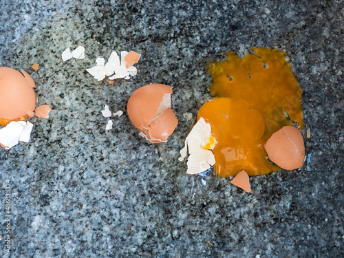 
broken egg on granite floor