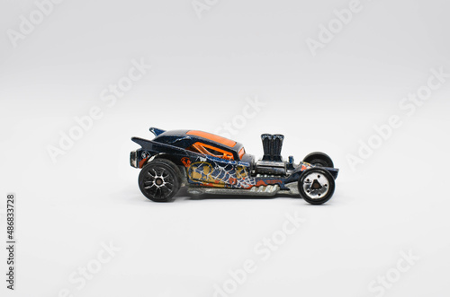 a racing car .a toy car on a white background.