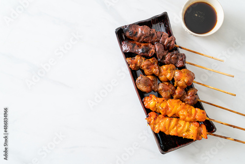 Japanese chicken grill or yakitori serve in izakaya style photo