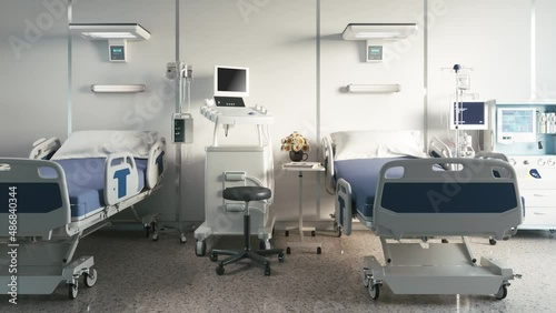 Two empty bed in a hospital room with medical equipment