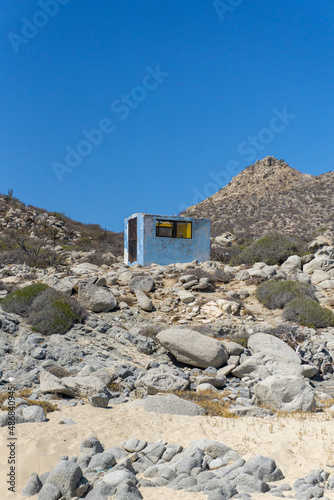 old tiny blue house in the mountain