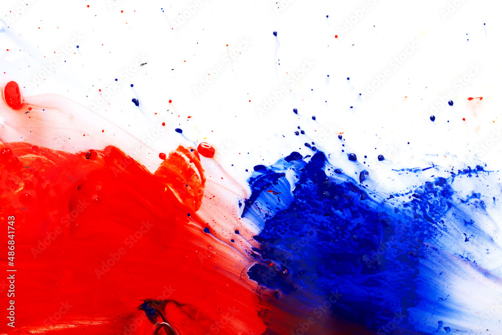 Drops of red and blue paint on a white background. Stock Photo | Adobe
