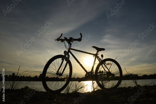 silhouette of a bicycle © taveesaksri