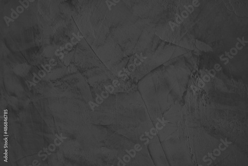 Fényképezés Black plaster texture, dark grey or black stone plastered wall, venetian stucco close-up