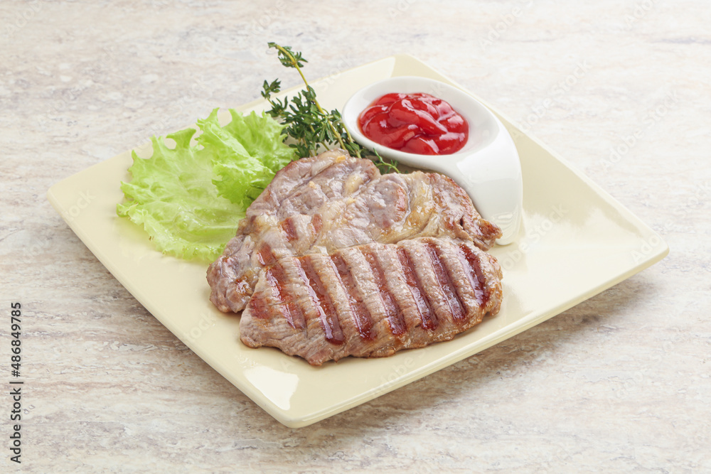 Grilled pork neck steak with ketchup Grilled pork neck steak with ketchup
